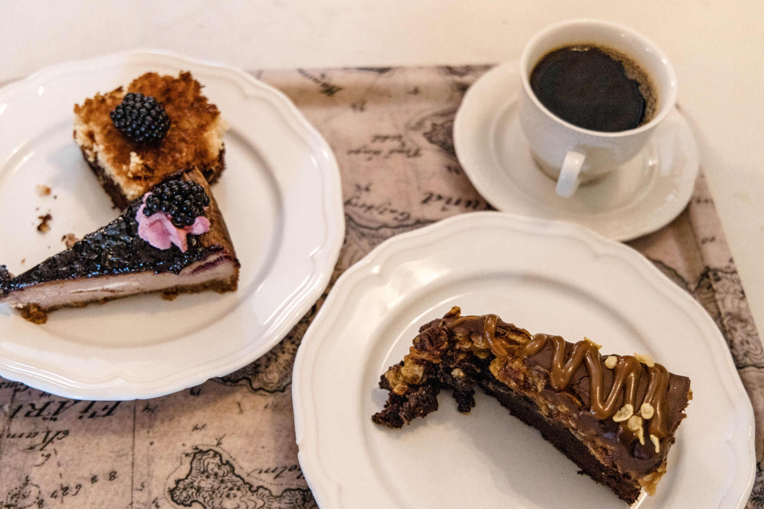 Fika at Café Parkvillan. Desserts anda coffee on a tray.