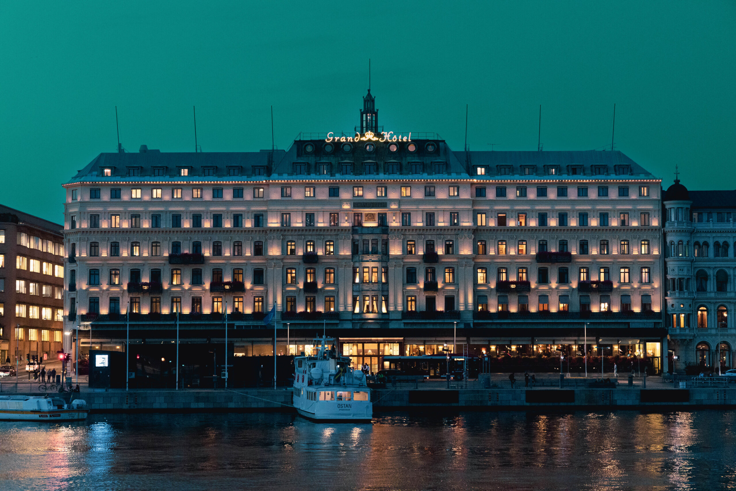 View of Grand Hotel building in Stockholm at night.