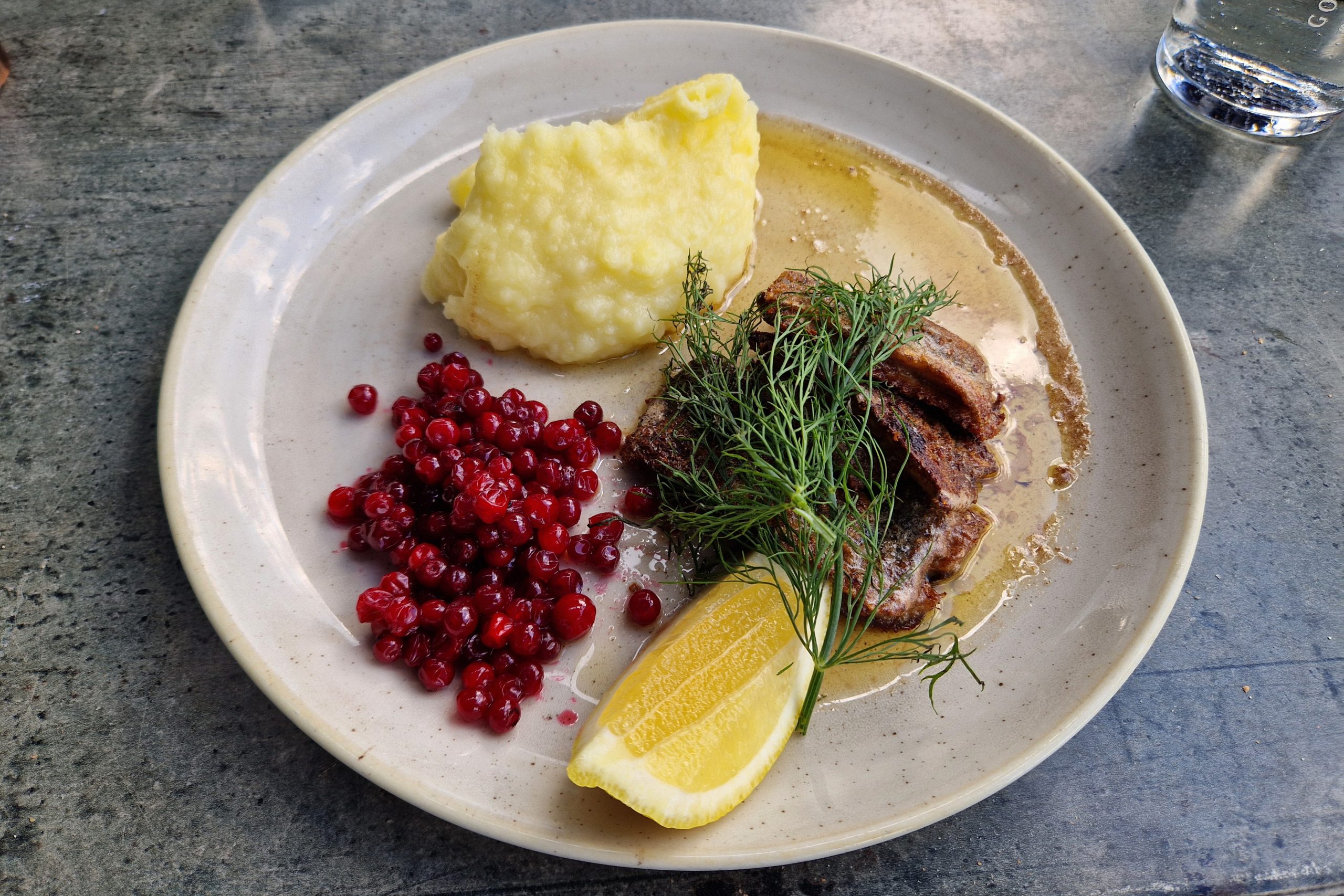 Swedish dish "stekt strömming med potatismos" (fried herring with mashed potatoes) at restaurant Hamnkrogen Vaxholm, Stockholm, Sweden.